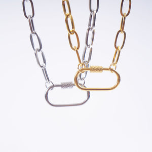 Gold and silver carabiner necklaces side by side