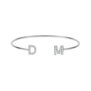 Silver dainty double initial cuff bracelet with the letters D and M