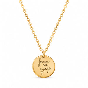 Gold handwriting necklace with a round disc engraved forever and always with a heart