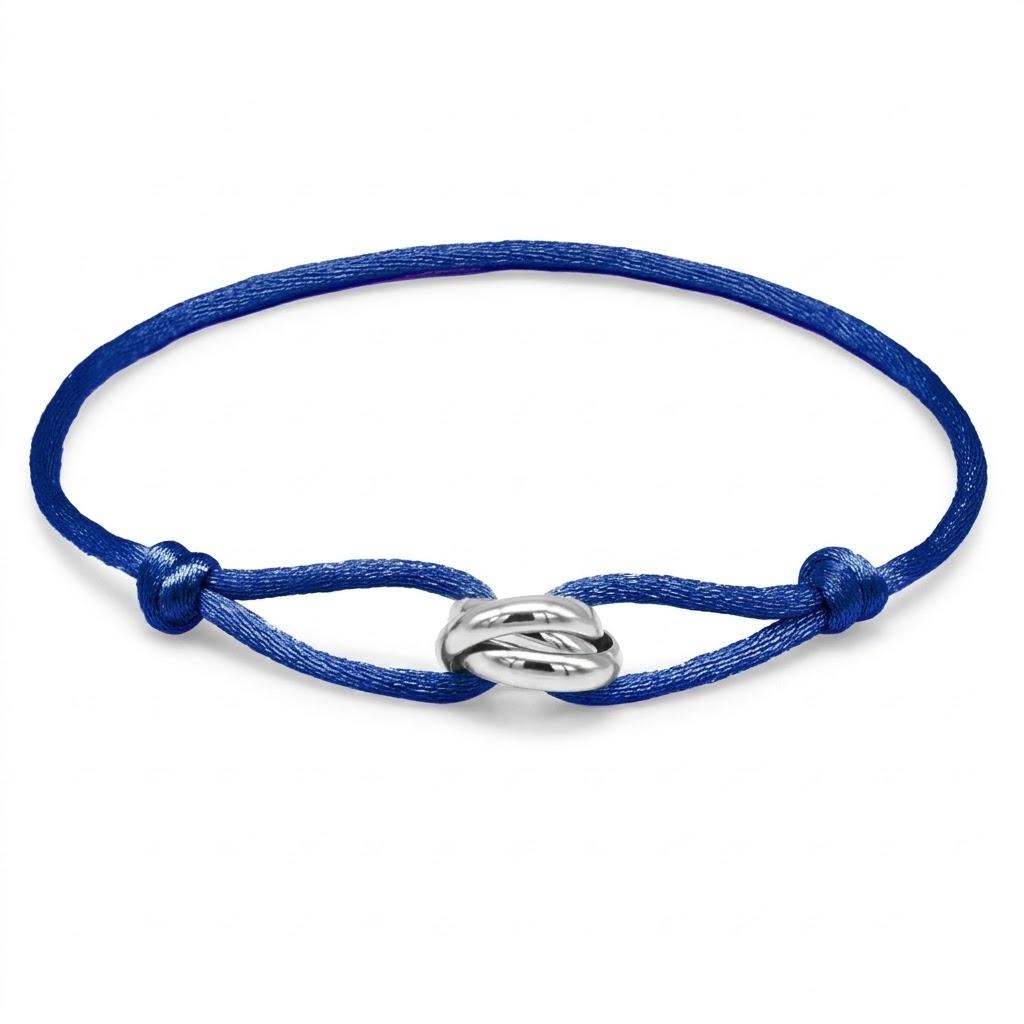 Navy blue beaded bracelet with a silver ring clasp on a white background