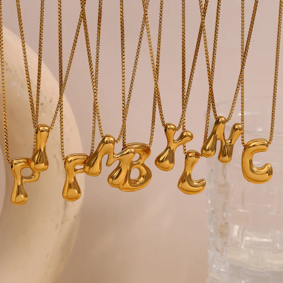Bold Bubble Initial Pendant Necklace Gold multiple letter variants hanging together