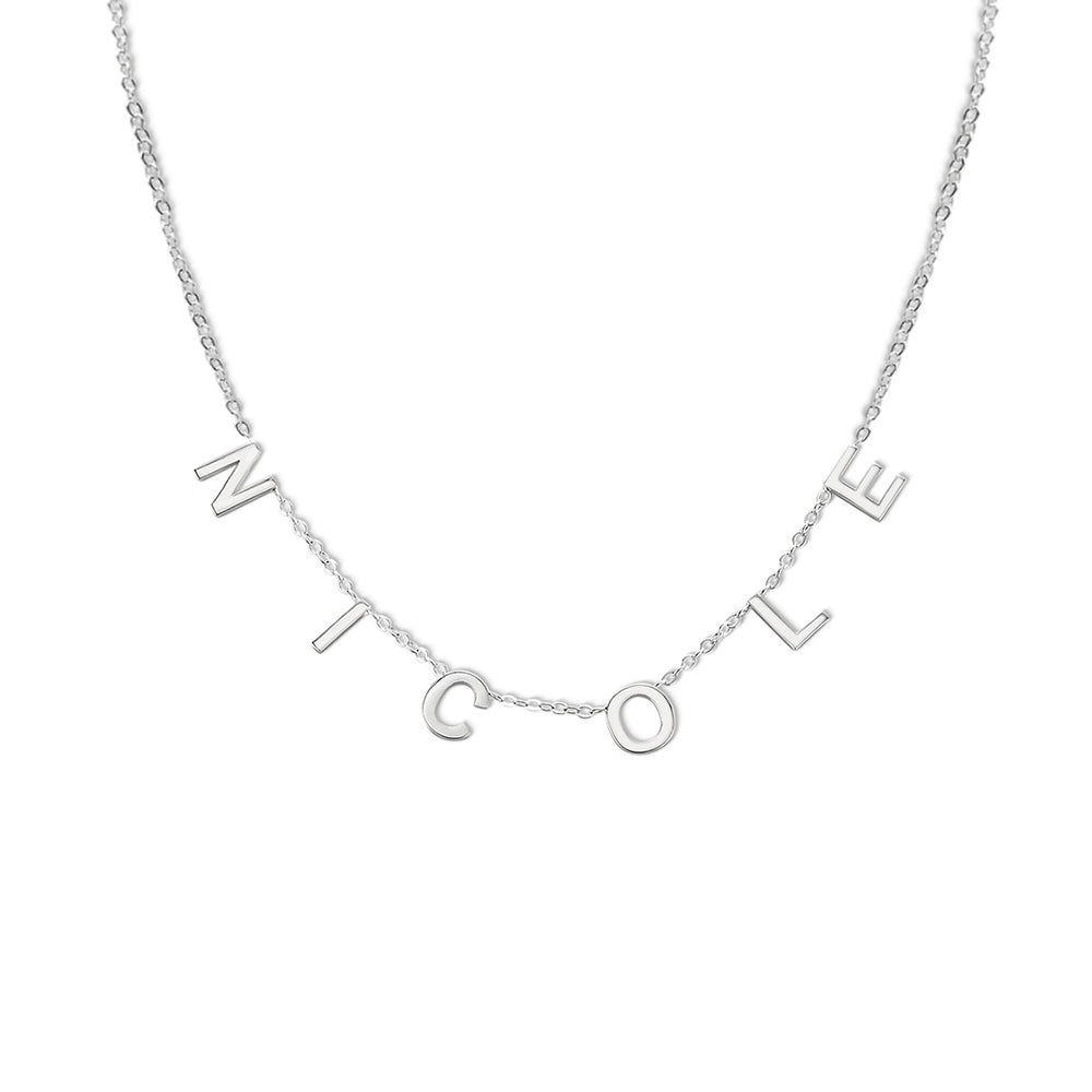 Silver bold charms name necklace with the letters N I C O L E