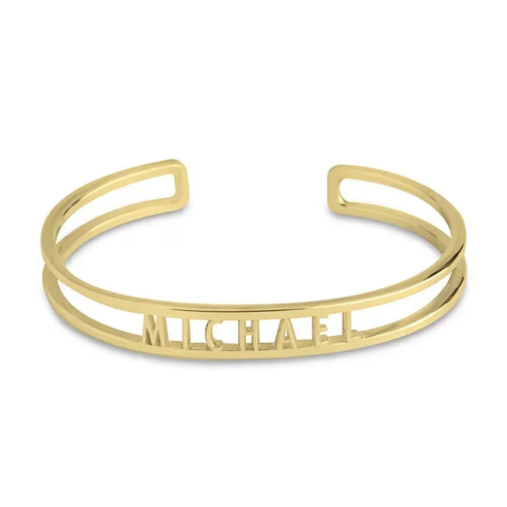 Gold name cuff bracelet with the cut-out name Michael