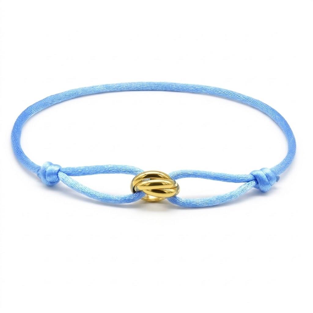 Light Blue bracelet with a gold clasp on a white background