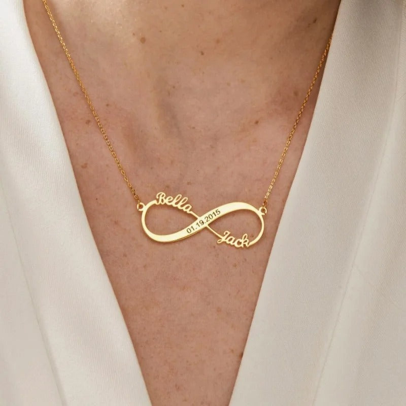 Gold infinite love necklace with the names Bella and Jack worn on the neck