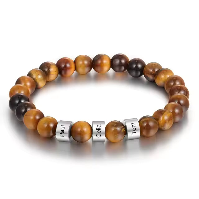 Men's tiger eye bracelet with silver beads engraved with the names Paul, Celia and Tom